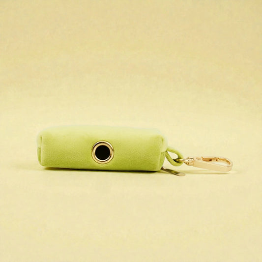 green dog poop bag holder with clip and a zip