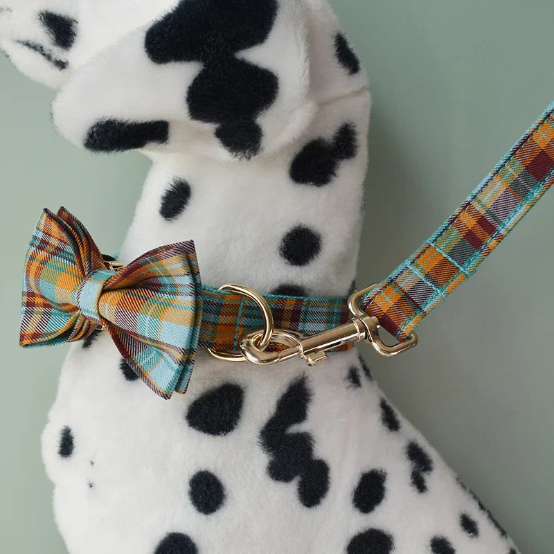 Handmade Tartan Tails collection grid pet leash in heather green with customizable engravings, detachable bow tie, and quick release mechanism.