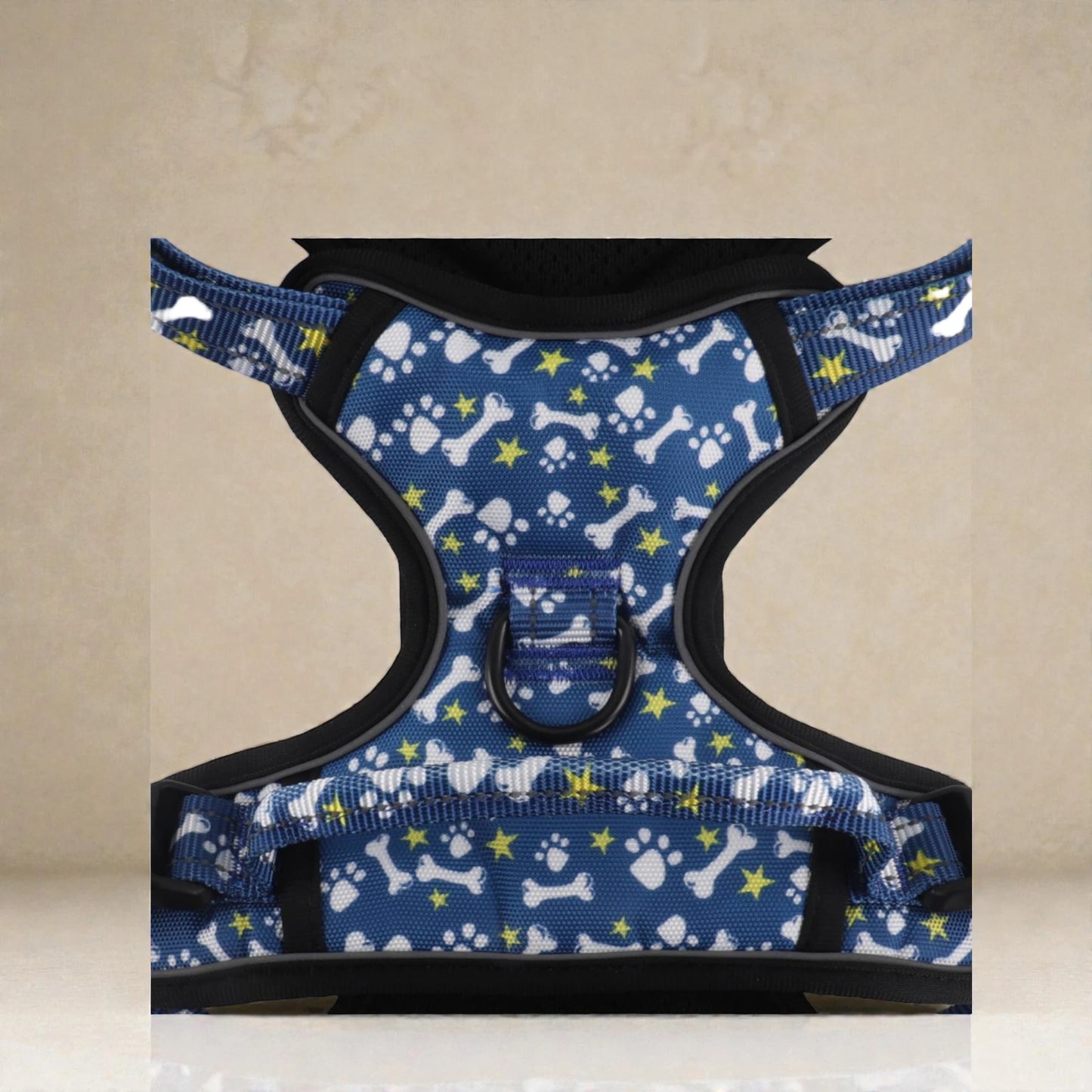 Dog harness with blue pattern on a beige background