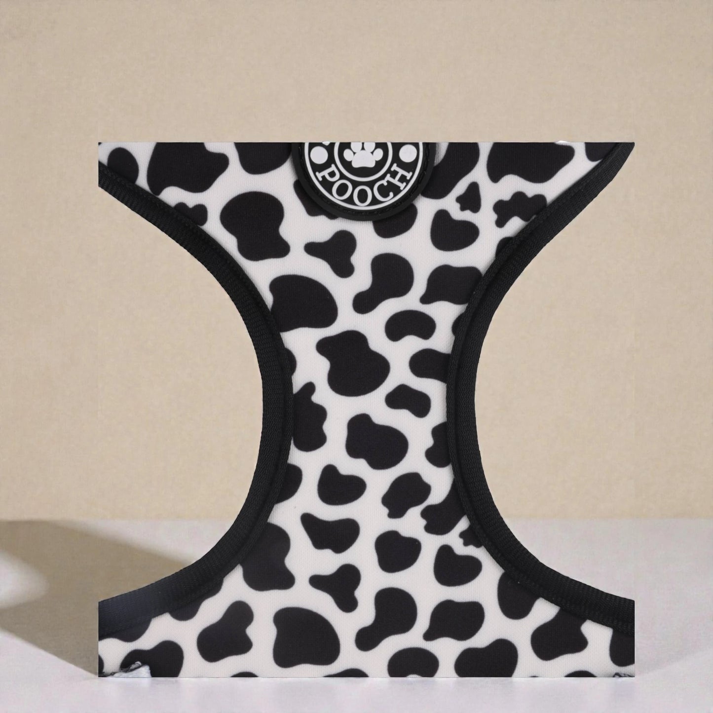 cow print detail of slip on dog harness