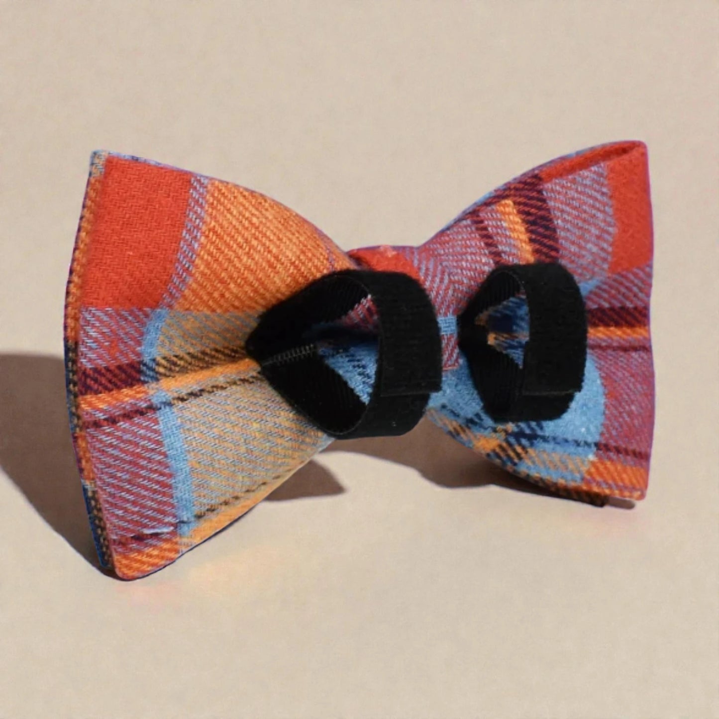 Plaid blue detachable bow tie on a beige background