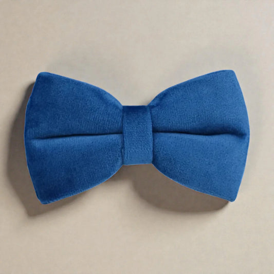 Blue bow tie on a beige background
